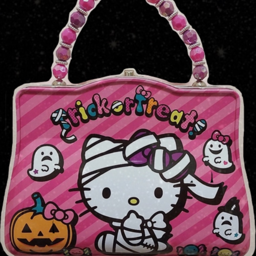 hello kitty trick or treat halloween purse tin